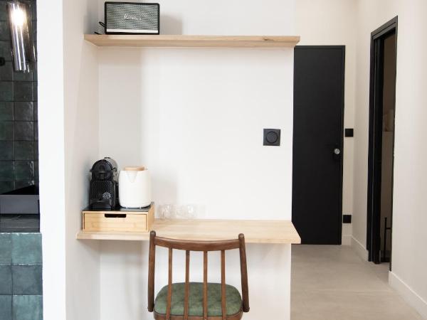 Mouchki : photo 6 de la chambre chambre double deluxe avec baignoire