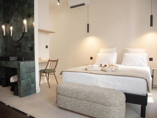 Mouchki : photo 8 de la chambre chambre double deluxe avec baignoire