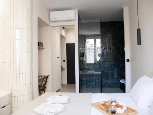 Mouchki : photo 3 de la chambre chambre double deluxe avec baignoire