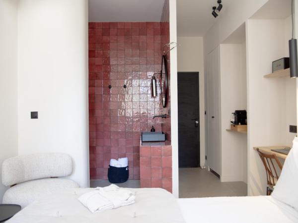 Mouchki : photo 4 de la chambre chambre double deluxe avec baignoire