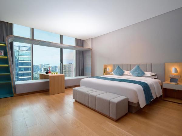 Pagoda Hotel Hangzhou Binjiang : photo 1 de la chambre chambre double deluxe (2 adultes + 1 enfant)