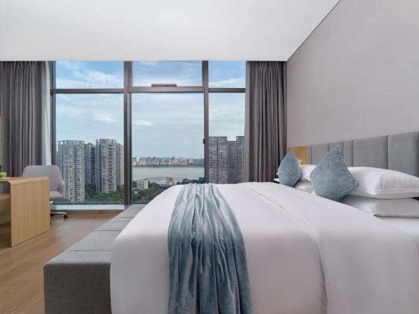 Pagoda Hotel Hangzhou Binjiang : photo 1 de la chambre chambre double deluxe (1 adulte + 1 enfant)