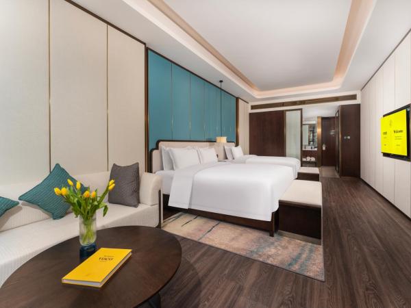 voco - Hangzhou Binjiang Minghao, an IHG Hotel : photo 1 de la chambre premium king room with one king bed and one single bed