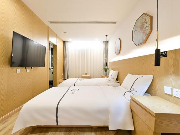 Xingshe Alley Courtyard Hotel Beijing Wangfujing Forbidden City Branch : photo 3 de la chambre li yuan deluxe twin room