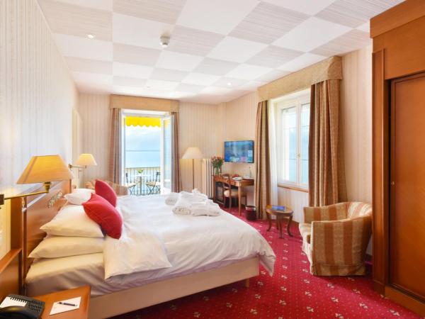 Golf Hotel René Capt : photo 1 de la chambre chambre double ou lits jumeaux deluxe - vue sur lac