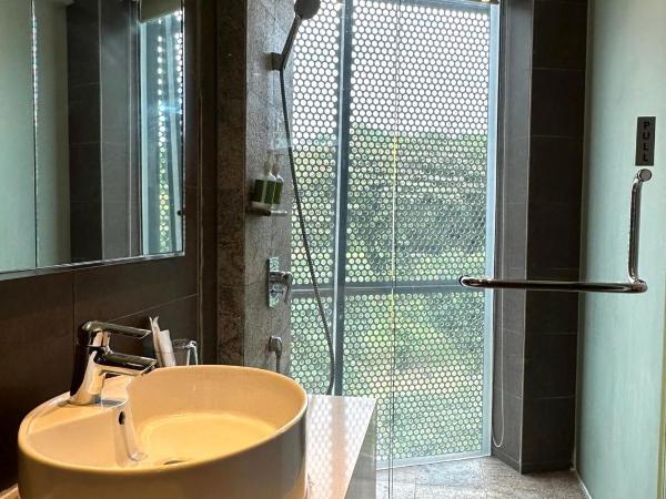 D'Hotel Singapore managed by The Ascott Limited : photo 2 de la chambre chambre lits jumeaux deluxe