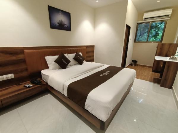 Moon Lite Residency - Malad West : photo 2 de la chambre chambre deluxe