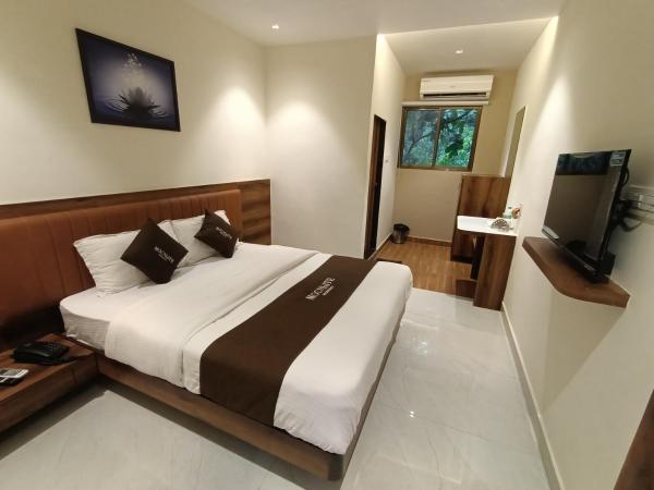Moon Lite Residency - Malad West : photo 4 de la chambre chambre deluxe