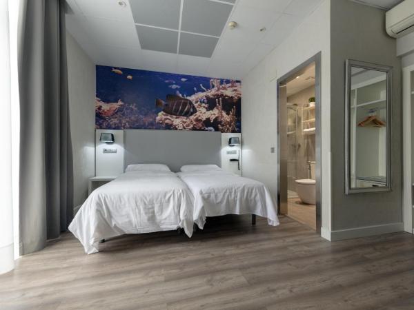 Standbyme Ramblas : photo 4 de la chambre chambre lits jumeaux - vue sur ville