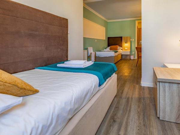 Hotel Koral : photo 4 de la chambre chambre lits jumeaux