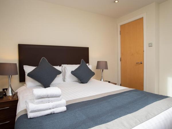 Grand Plaza Serviced Apartments : photo 3 de la chambre appartement exécutif quadruple