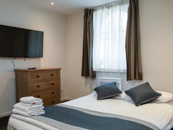 Grand Plaza Serviced Apartments : photo 10 de la chambre studio exécutif quadruple