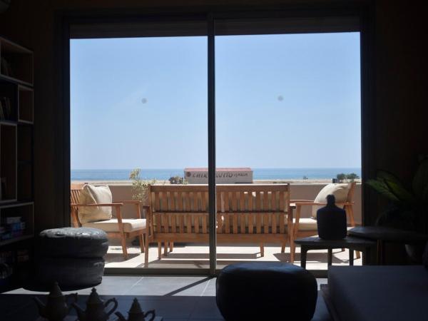 Immi : photo 1 de la chambre appartement - vue sur mer
