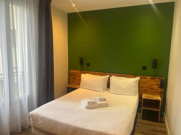 Hôtel De La Perdrix Rouge : photo 1 de la chambre grande chambre double