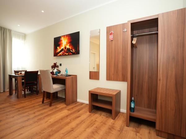 Hotel Attaché an der Messe : photo 6 de la chambre superior studio - basement with sofa bed