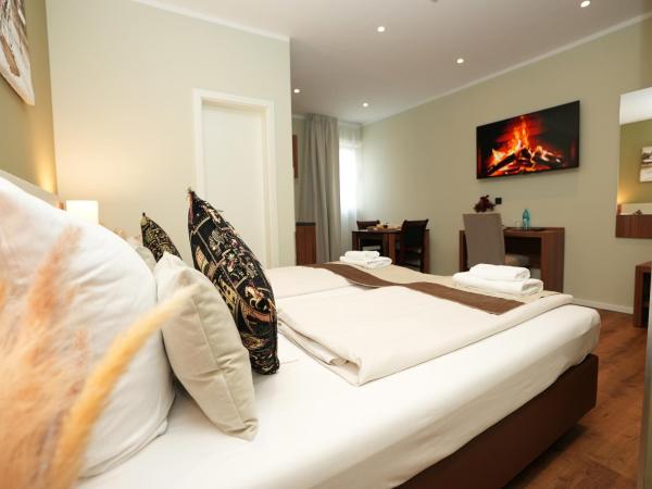 Hotel Attaché an der Messe : photo 1 de la chambre superior studio - basement with sofa bed