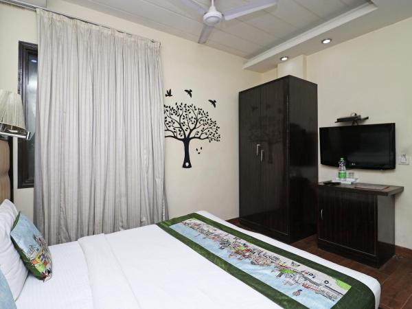 Super Collection O 980 Hotel Ramhan : photo 9 de la chambre chambre triple classique