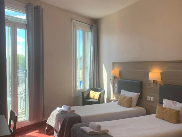 Brit Hotel Bleu Nuit : photo 2 de la chambre chambre lits jumeaux