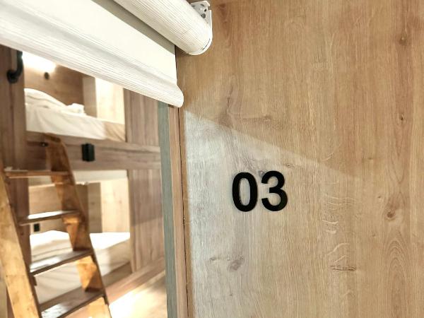 The POD Suite Hostel Village : photo 4 de la chambre b03 mixed lower bed in shared room with 20 beds