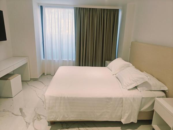 Ibiscus Hotel : photo 9 de la chambre suite familiale
