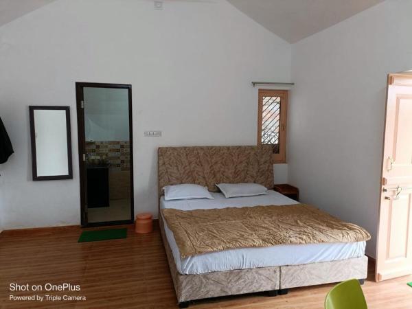 Jamnagar Villas and home : photo 7 de la chambre studio avec vue sur jardin