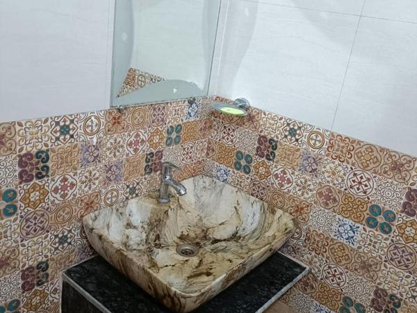 Jamnagar Villas and home : photo 8 de la chambre studio avec vue sur jardin