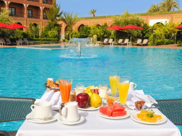 DWO Marrakech Ennakhil : photo 10 de la chambre chambre double ou lits jumeaux supérieure - vue sur jardin