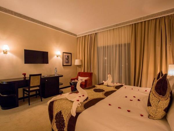 DWO Marrakech Ennakhil : photo 7 de la chambre chambre double ou lits jumeaux supérieure - vue sur jardin