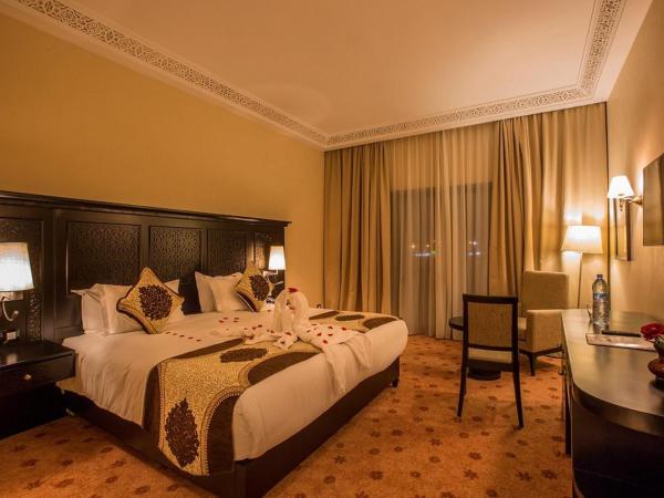 DWO Marrakech Ennakhil : photo 5 de la chambre chambre double ou lits jumeaux supérieure - vue sur jardin