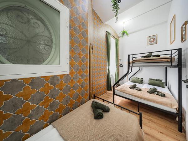 Bloom by Home1 : photo 1 de la chambre chambre quadruple avec salle de bains commune