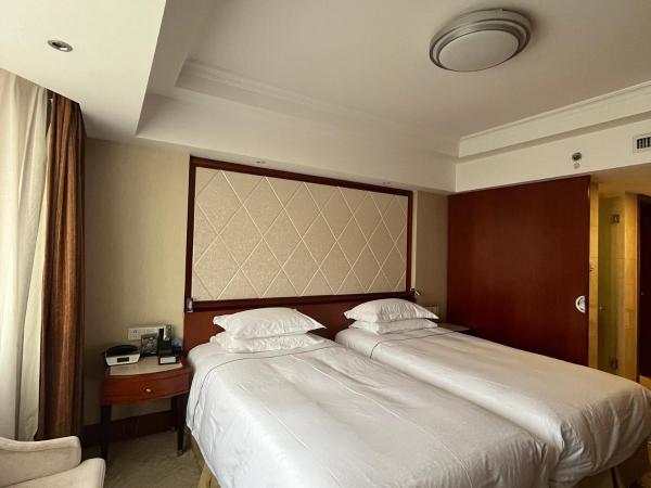 Hangzhou Xinqiao Hotel : photo 3 de la chambre chambre lits jumeaux deluxe - vue sur lac