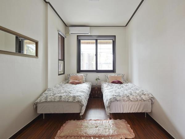 Jiwoljang Guesthouse : photo 1 de la chambre chambre lits jumeaux standard b