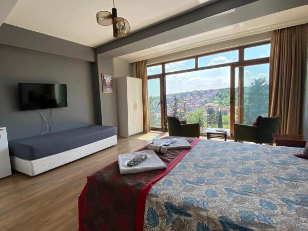 Bude Suite Ortaköy : photo 6 de la chambre chambre quadruple - vue sur mer