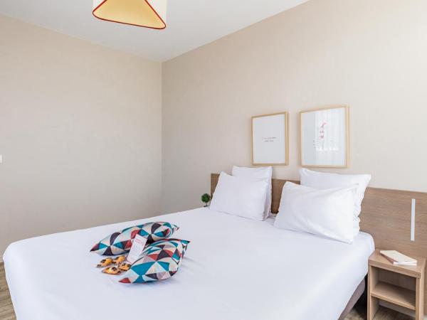 Appart'City Confort Cherbourg : photo 1 de la chambre appartement (4 adultes)