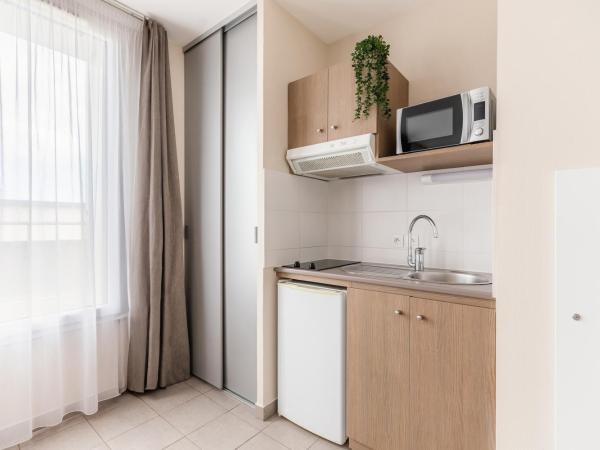 Appart'City Confort Cherbourg : photo 5 de la chambre appartement supérieur