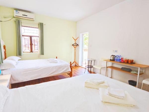 Cloud Tree Inn Yun Shu Li ,Xichong, Shenzhen : photo 7 de la chambre chambre quadruple avec terrasse 