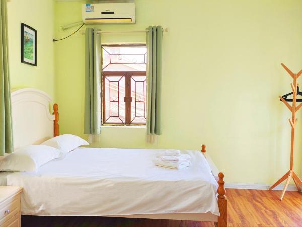 Cloud Tree Inn Yun Shu Li ,Xichong, Shenzhen : photo 4 de la chambre chambre quadruple avec terrasse 