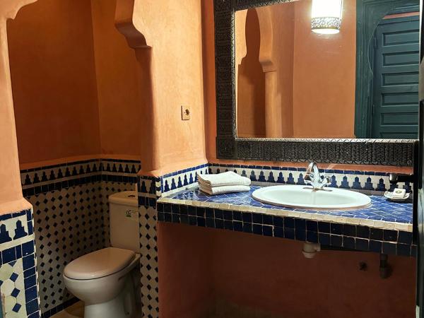 Palais Riad Berbère : photo 9 de la chambre portes coulissantes dans la suite familiale deluxe.