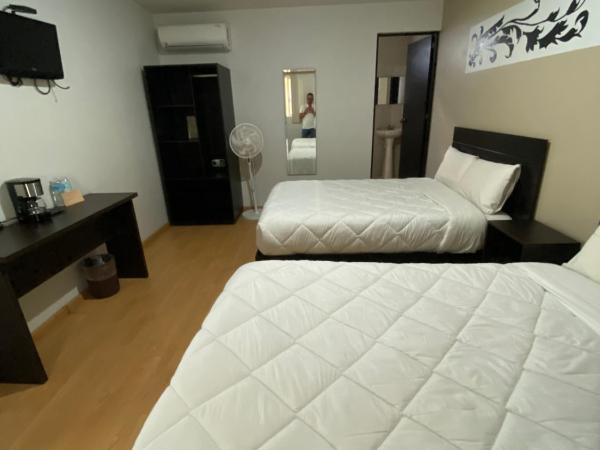 Los Sauces Morelia : photo 5 de la chambre chambre lits jumeaux
