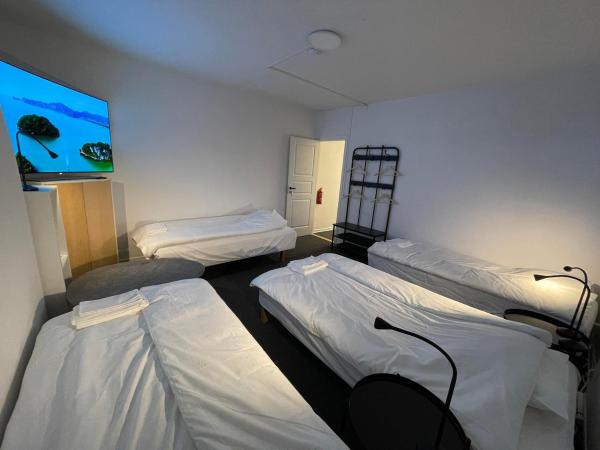 Kontorshotell Ringön : photo 1 de la chambre chambre quadruple classique