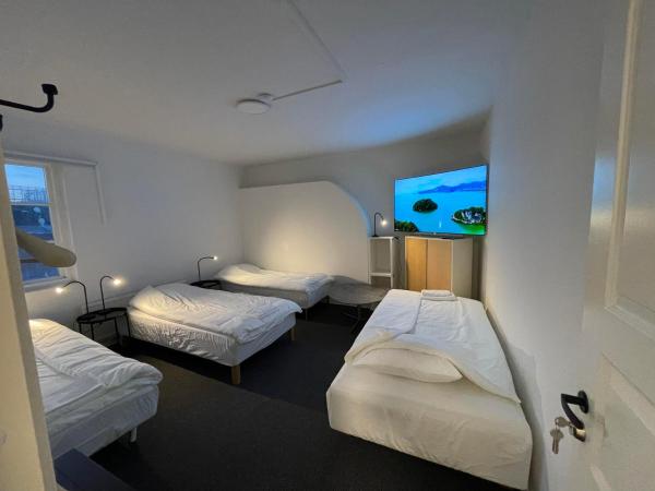 Kontorshotell Ringön : photo 2 de la chambre chambre quadruple classique