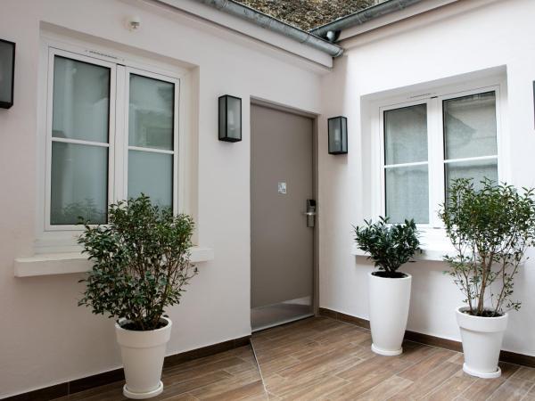 Hotel des Nations Saint Germain : photo 5 de la chambre chambre quadruple