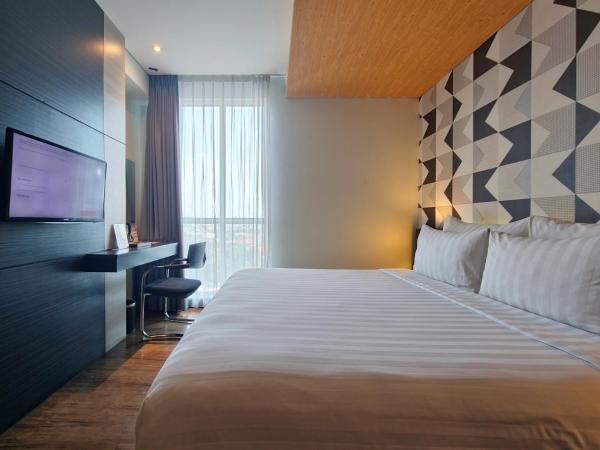 Luminor Hotel Jemursari By WH : photo 3 de la chambre chambre deluxe double ou lits jumeaux