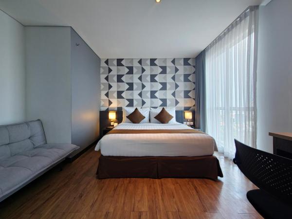 Luminor Hotel Jemursari By WH : photo 3 de la chambre chambre exécutive