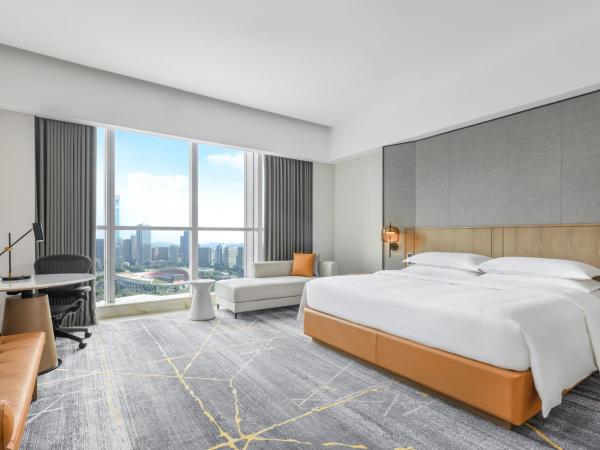 Sheraton Guangzhou Hotel : photo 1 de la chambre chambre lit king-size premier deluxe - vue sur stade tianhe