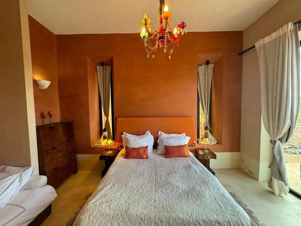 Villa Kela Serene : photo 2 de la chambre chambre triple avec salle de bains privative