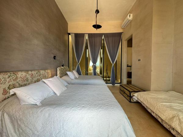 Villa Kela Serene : photo 2 de la chambre chambre familiale avec salle de bains privative
