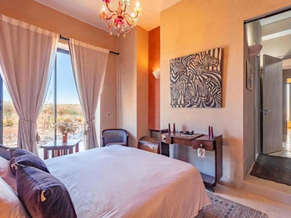 Villa Kela Serene : photo 3 de la chambre chambre triple avec salle de bains privative