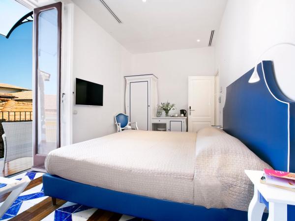 La Casa dell'Orologio - MAIN SQUARE : photo 2 de la chambre chambre double ou lits jumeaux avec balcon