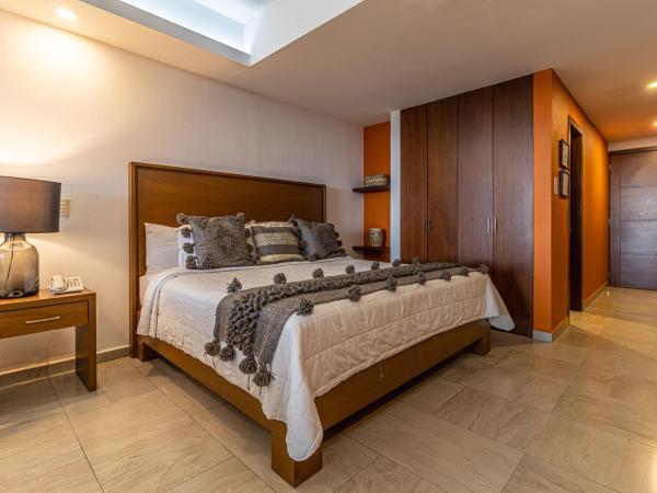 The Paramar Beachfront Boutique Hotel With Breakfast Included - Downtown Malecon : photo 2 de la chambre grande suite deluxe avec 2 lits king-size - vue sur océan